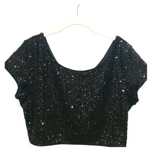 Black sequin crop top and midi length skirt